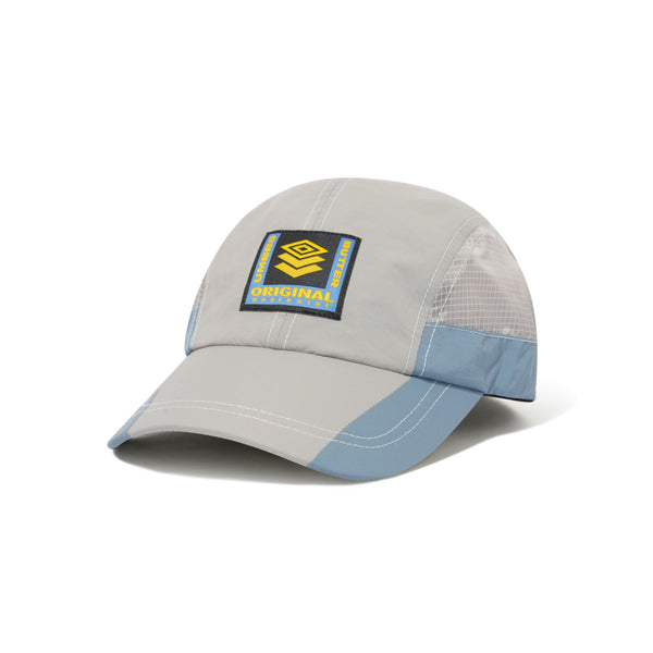 BUTTER GOODS Umbro Training Cap Cement